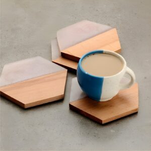 "Wood and marble coasters Hexagonal drink coasters Geometric coaster set Minimalist beverage coasters Elegant table protectors"
