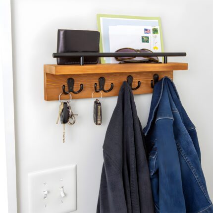 "Wall-mounted key holder Wooden mail organizer Entryway storage solution Key hooks with shelf Rustic modern home decor"