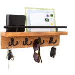 "Wall-mounted key holder Wooden mail organizer Entryway storage solution Key hooks with shelf Rustic modern home decor"
