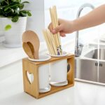 "Rustic utensil holder Wooden and glass kitchen organizer Heart-cut design utensil holder Farmhouse-style utensil rack Minimalistic kitchen decor"