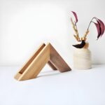 "Wooden napkin holder Minimalist napkin holder for tables Geometric wooden decor Eco-friendly tabletop accessories Modern tissue organizer"