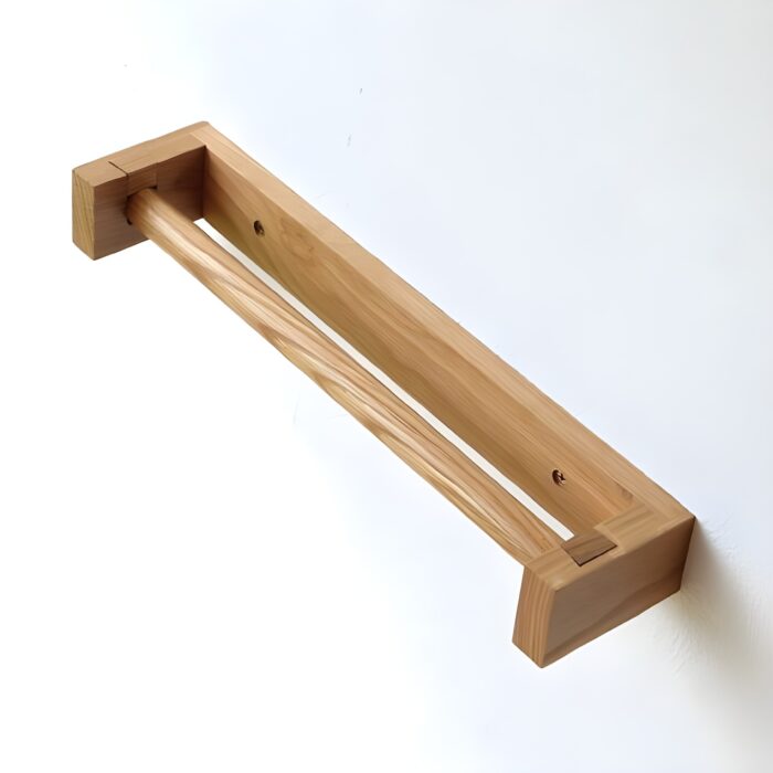 Wooden toilet paper holder Wall-mounted bathroom accessories Minimalist bathroom decor Rustic toilet roll holder Natural wood bathroom essentials