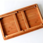 " Bamboo laptop stand Adjustable laptop bed tray Foldable laptop table Portable work desk Ergonomic laptop tray Laptop cooling table Bed tray for breakfast Bamboo lap desk Work-from-home desk Multifunctional laptop stand"